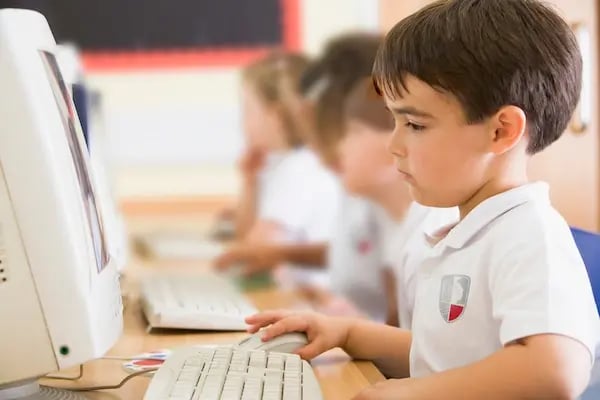 boy-working-on-a-computer-at-primary-school-PULBS2C[1]